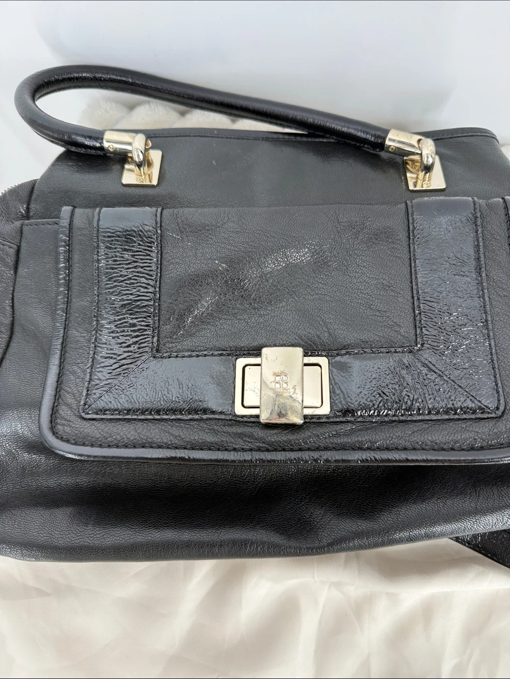Kate Spade Black Leather Top-Handle Satchel Handbag with crossbody strap